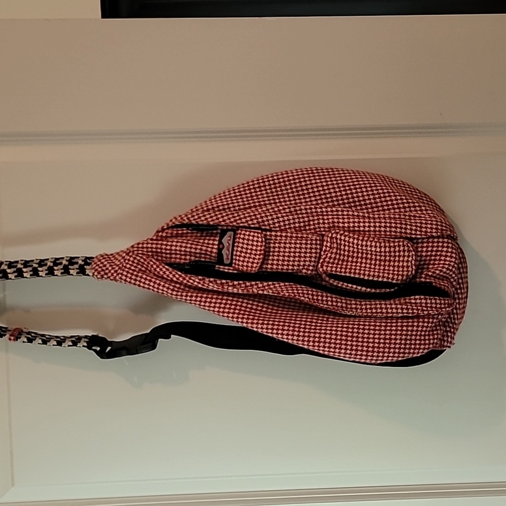 Kavu red and white houndstooth sling bag
